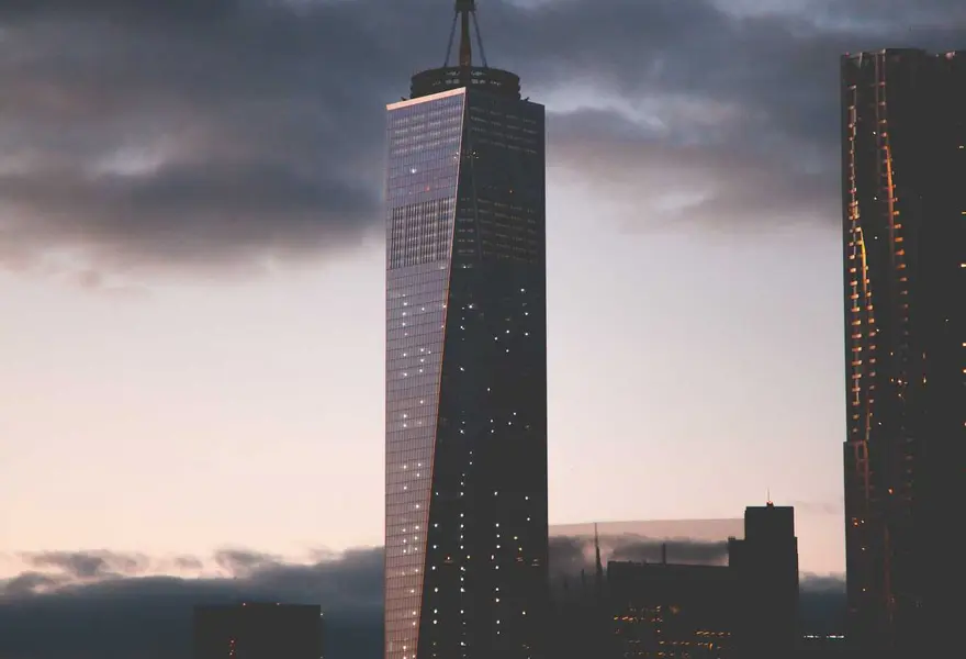Office towers against an evening sky